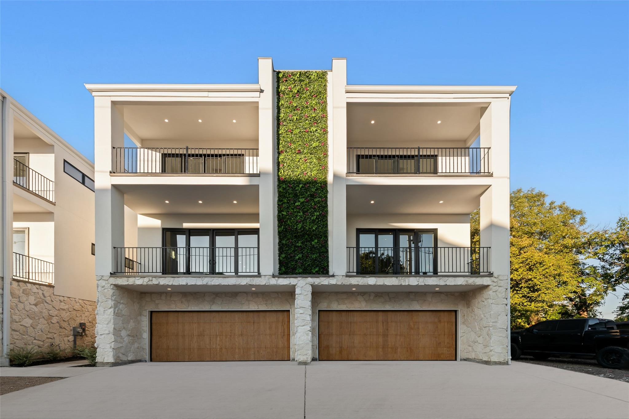 White building with green wall exterior