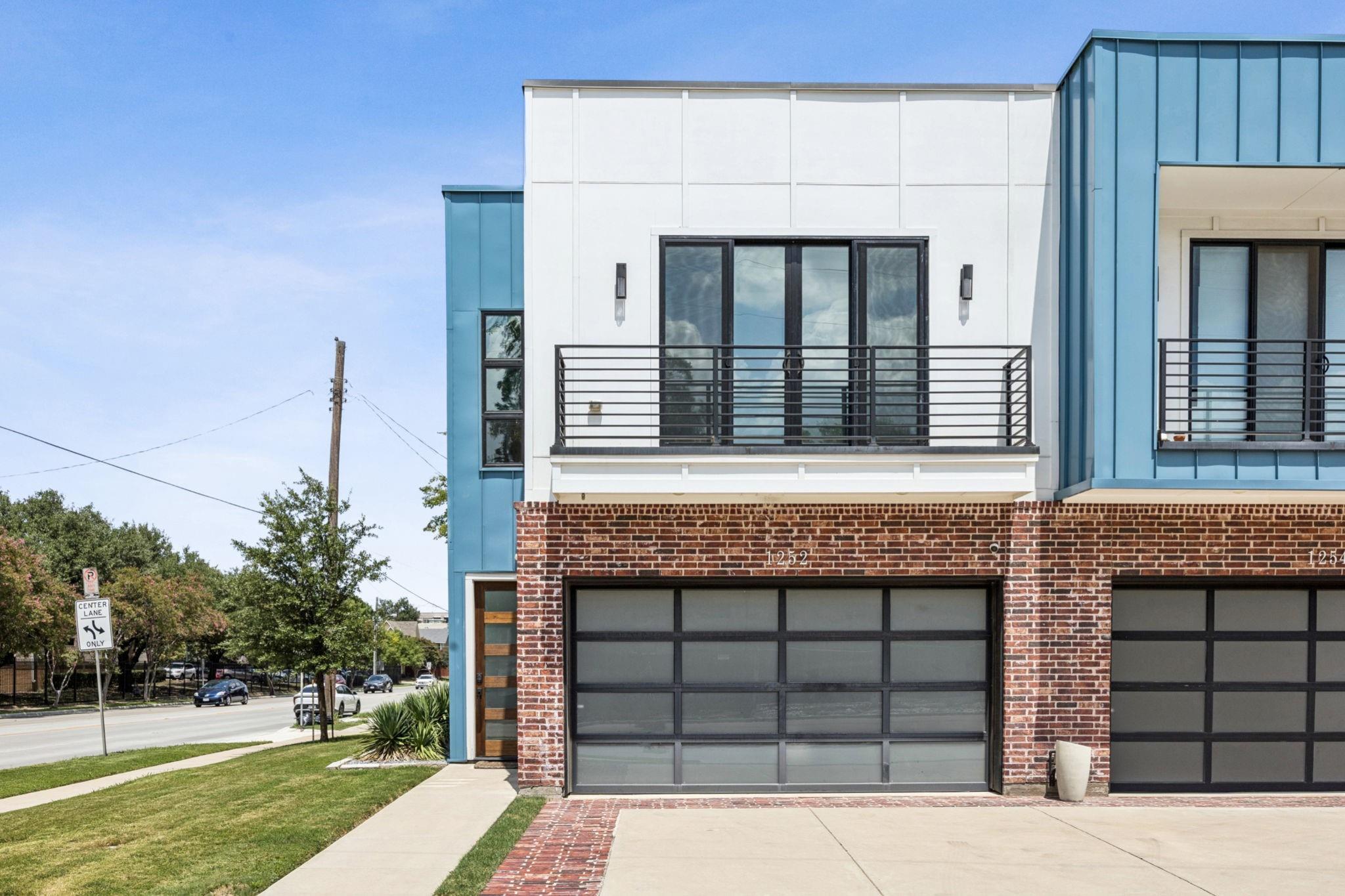 Brick building with blue accents exterior view