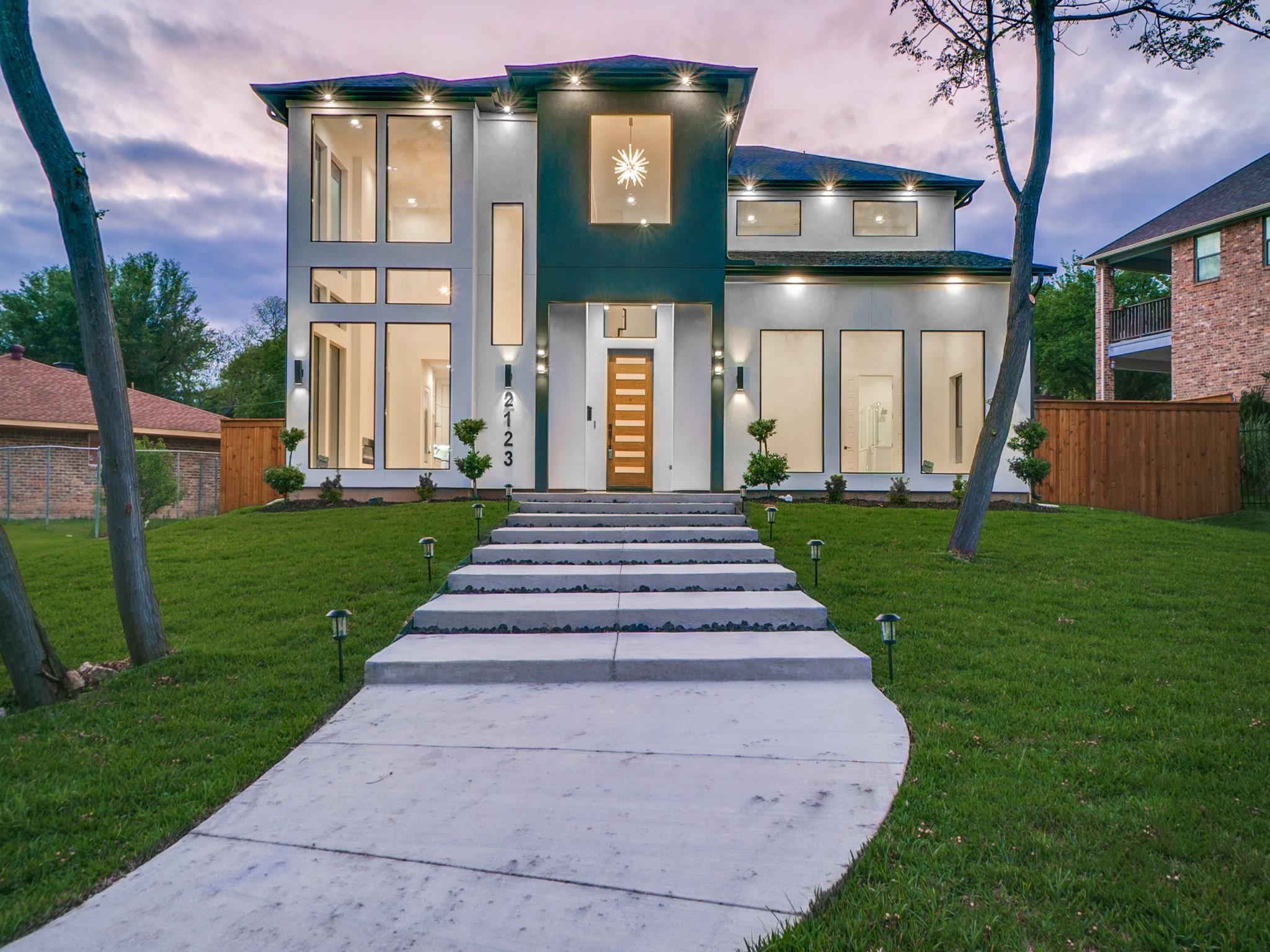 White and blue house exterior — active listing on Cedar Crest Golf Course corridor in South Dallas
