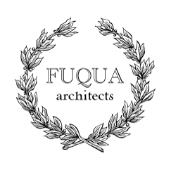 Professional headshot of a man in business attire, neutral background, approachable expression